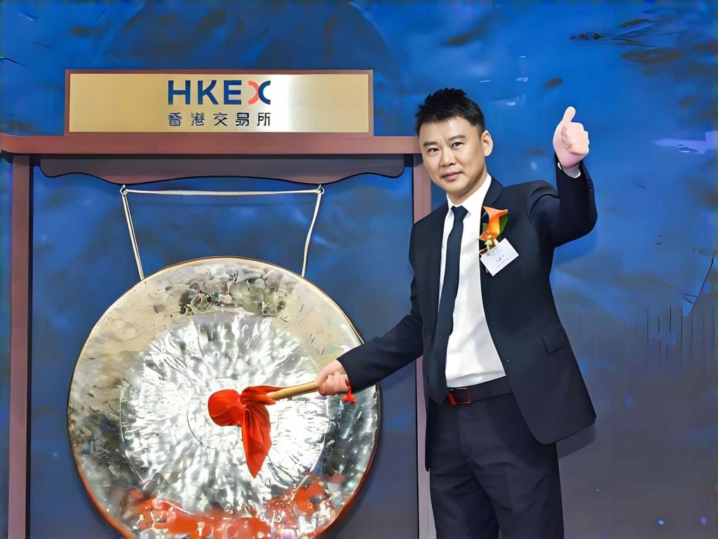 I am ringing the bell at the Hong Kong Stock Exchange image