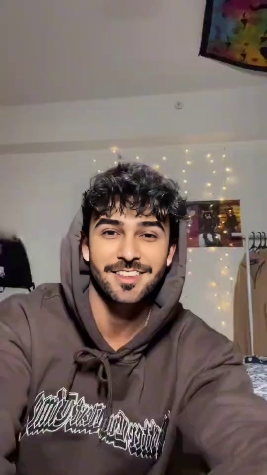 ​​Curly-Haired Boy​​ image