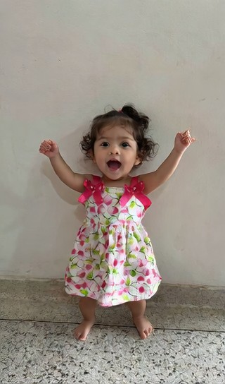 An adorable baby dancing image