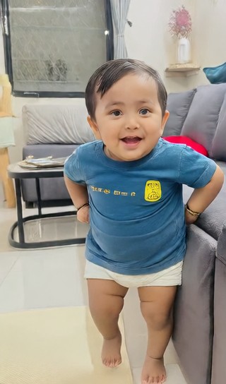 A boy dancing at home image