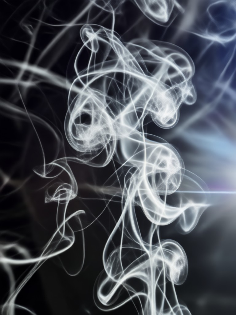 dramatic black and white smoke portrait