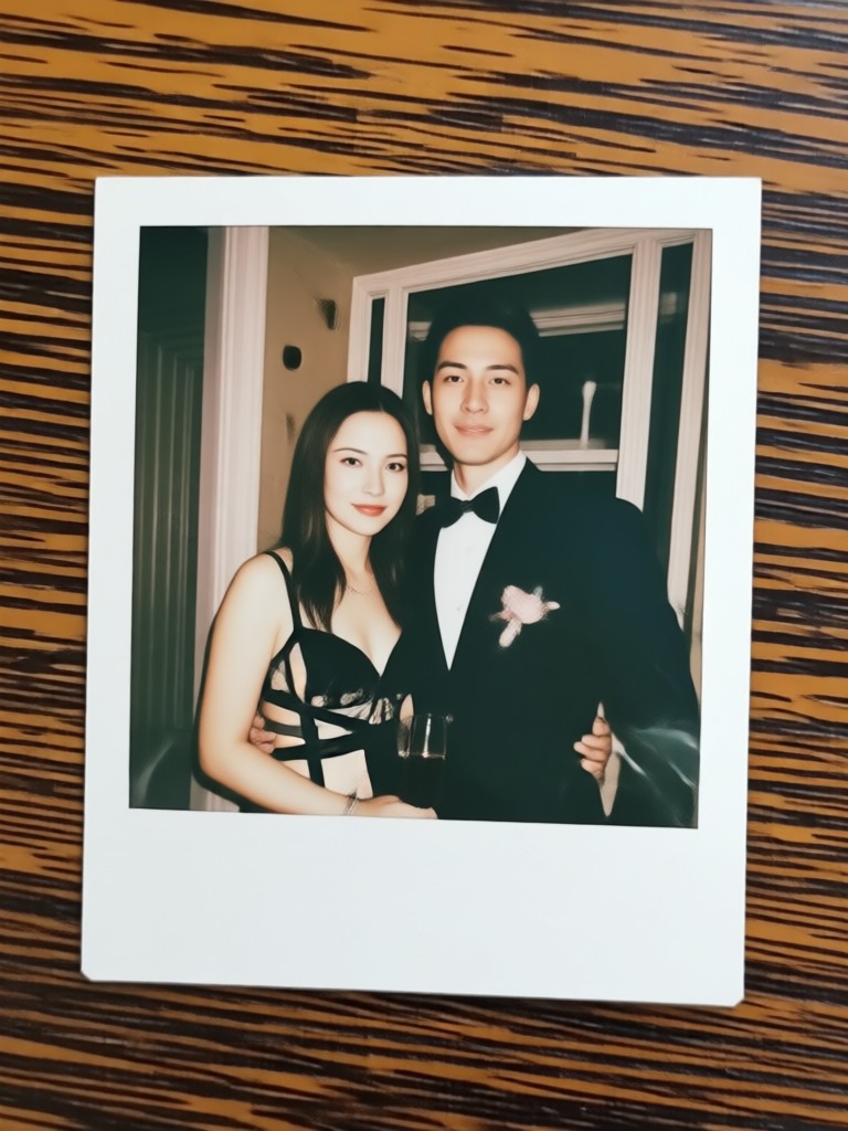 Black and white vintage Polaroid of a couple laughing