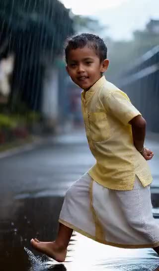 Children Dancing in the Rain image