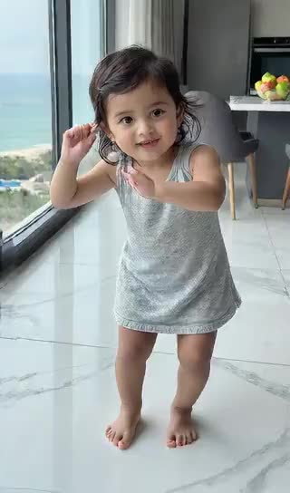 Happy Dance on the Baby's Bed image